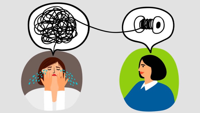 Psychotherapy concept with woman doctor and lady patient crying