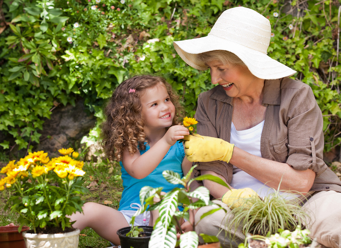 Grandmother daughter gardening