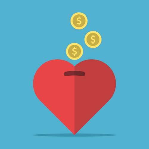 Money falling in heart-shaped money-box