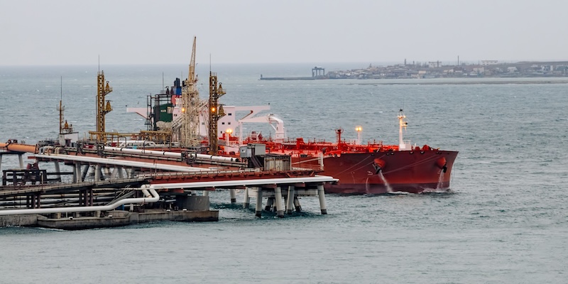 Tanker in front of an oil storage terminal waiting for loading in Tsemesskaya (Novorossiyskaya) bay.