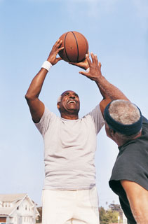 Older Men Playing Basketball