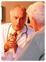 Doctor talking to older patient